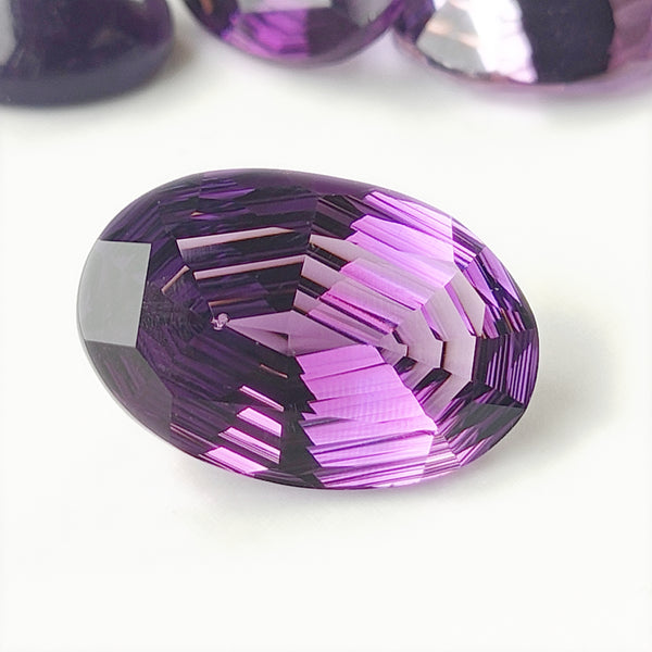Amethyst 21x14mm Oval Fantasy Cut Gemstone