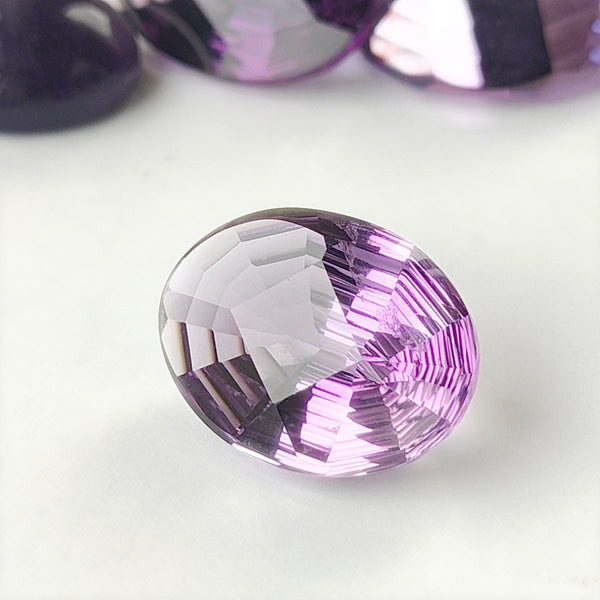 Amethyst 17x13mm Oval Fantasy Cut Gemstone