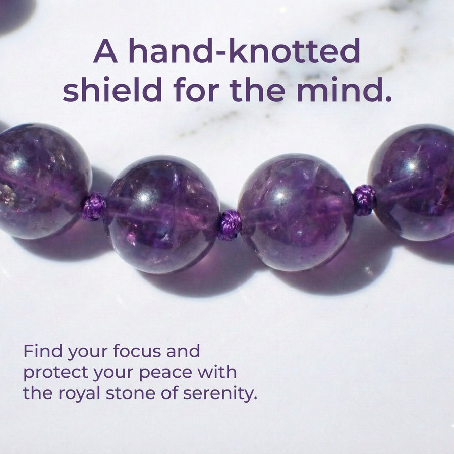 Hand-knotted 6mm natural deep violet Amethyst gemstone bracelet with an adjustable minimalist closure.